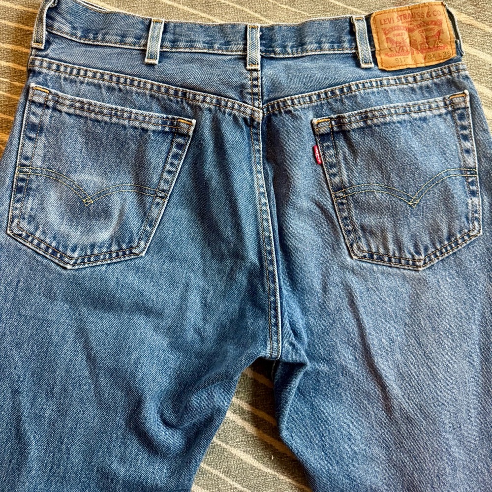 Vintage Levi's 517 Boot Cut Jeans with can ring | W 34 L 36